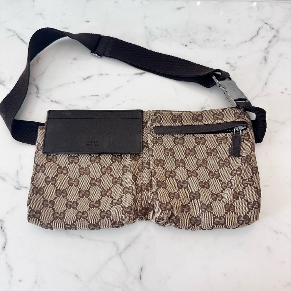 Gucci GG canvas waist bag with brown leather trim and silver-tone hardware
